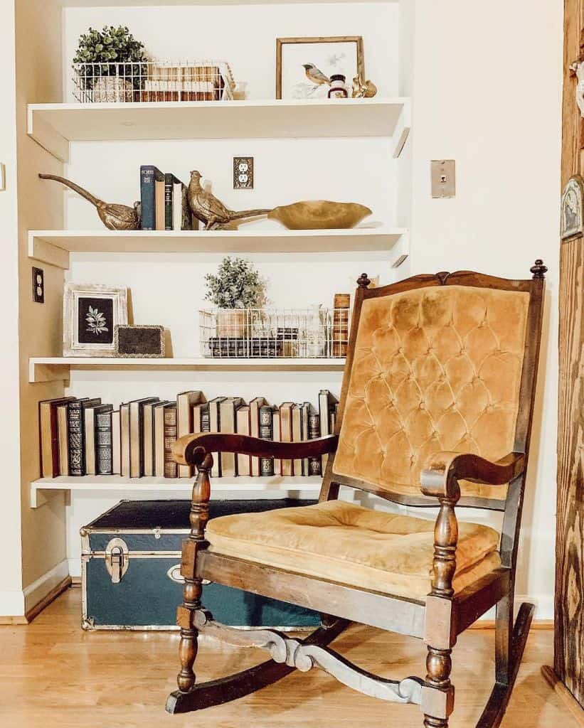 vintage chair next to bookshelf 