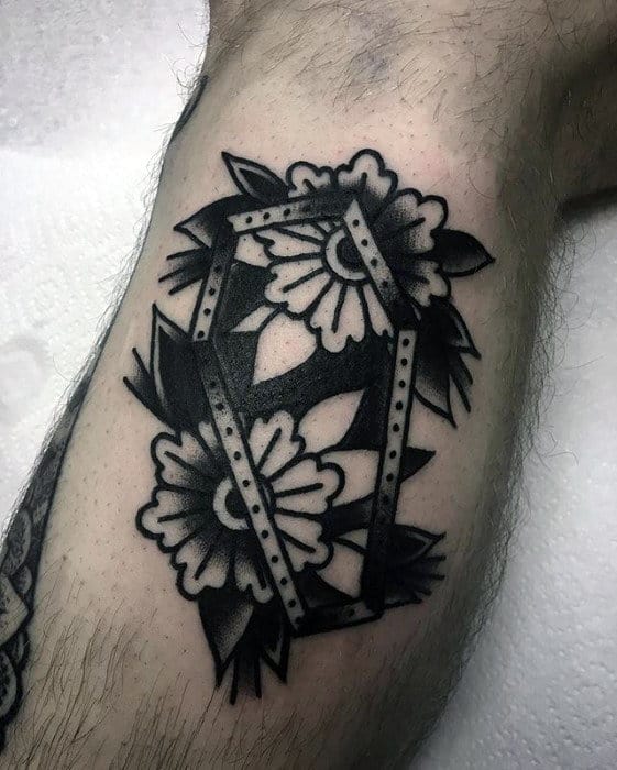 coffin-with-negative-space-flowers-mens-traditional-leg-tattoo