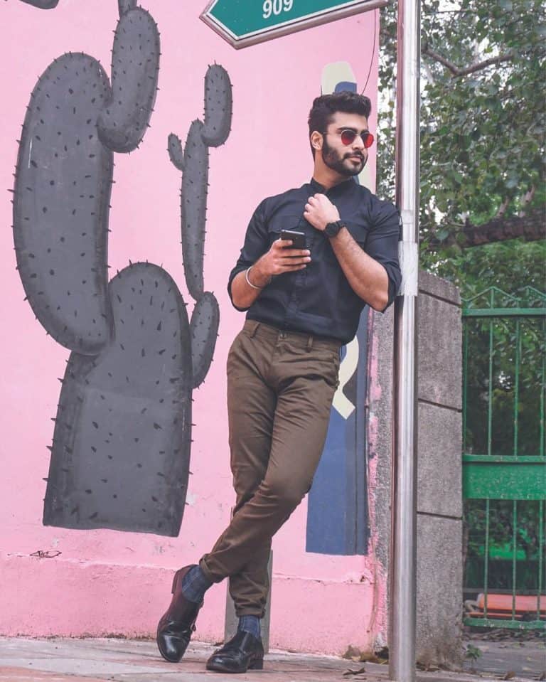 black shirt and green pants formal