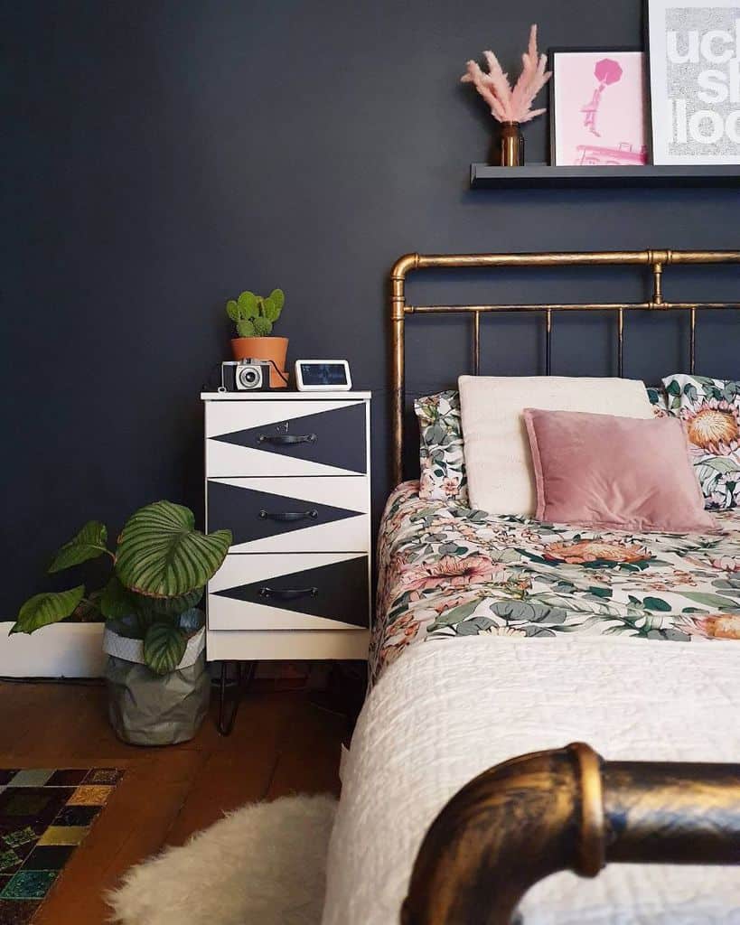 girls bedroom with gray walls and gold bed frame