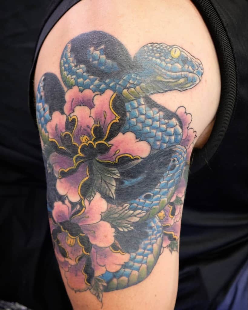 colored snake arm tattoo charmayne_ohara