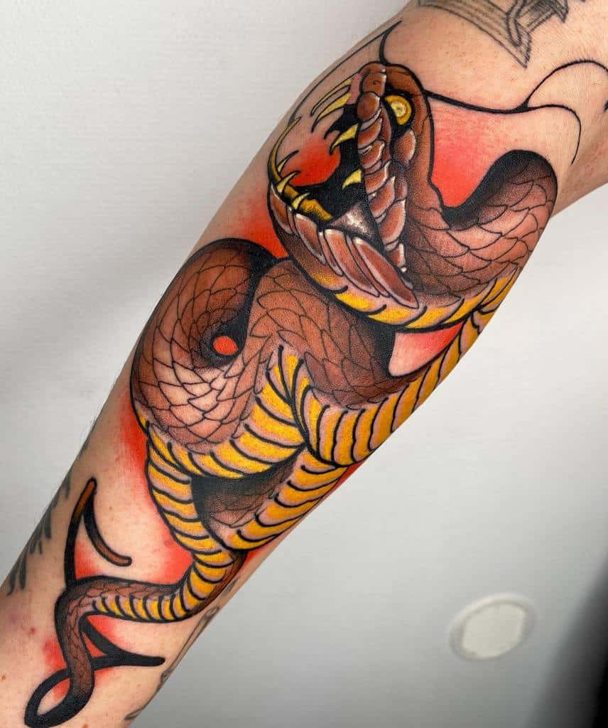 colored snake arm tattoo mcilroytattoo