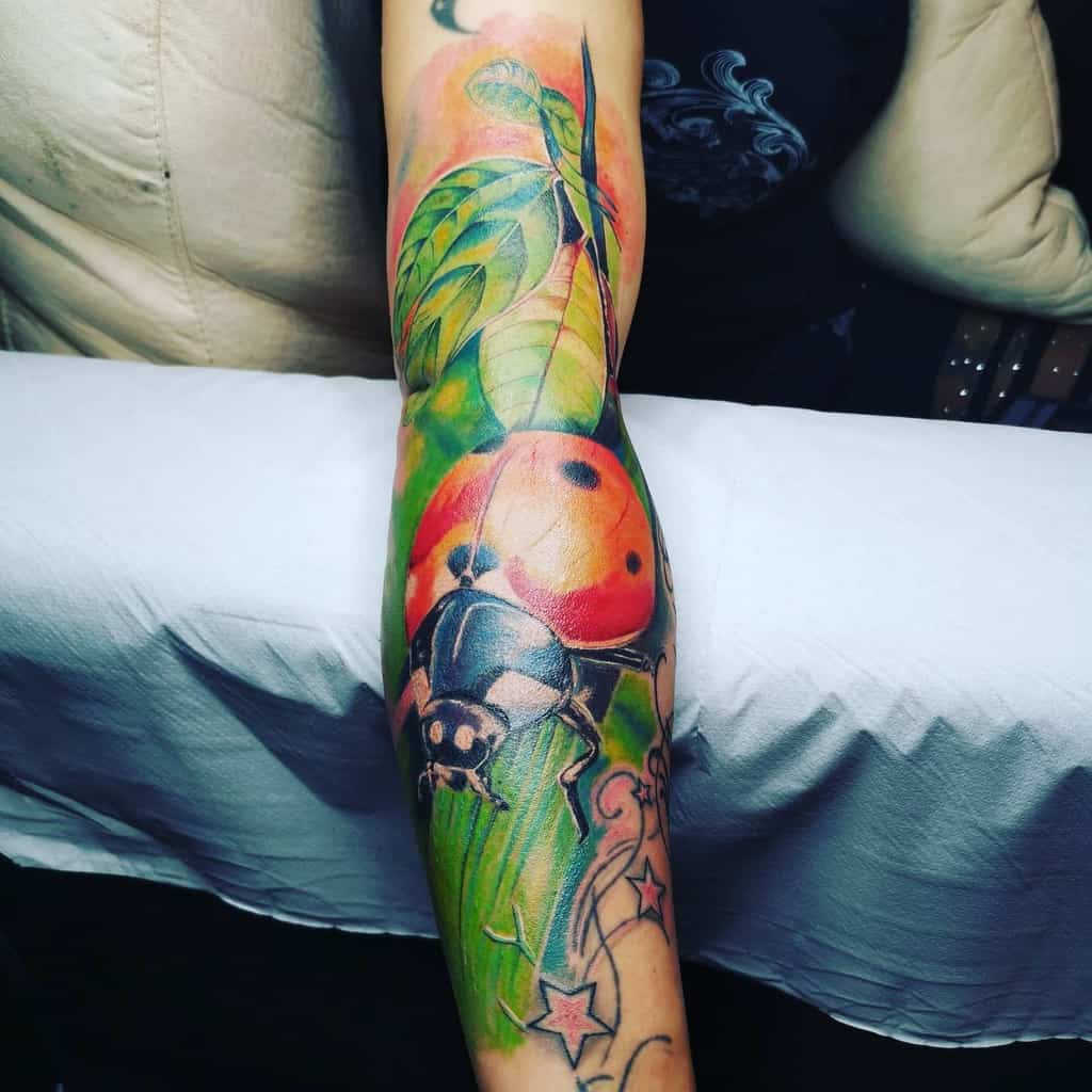colorful-arm-ladybug-tattoo-timotattoo_parnu