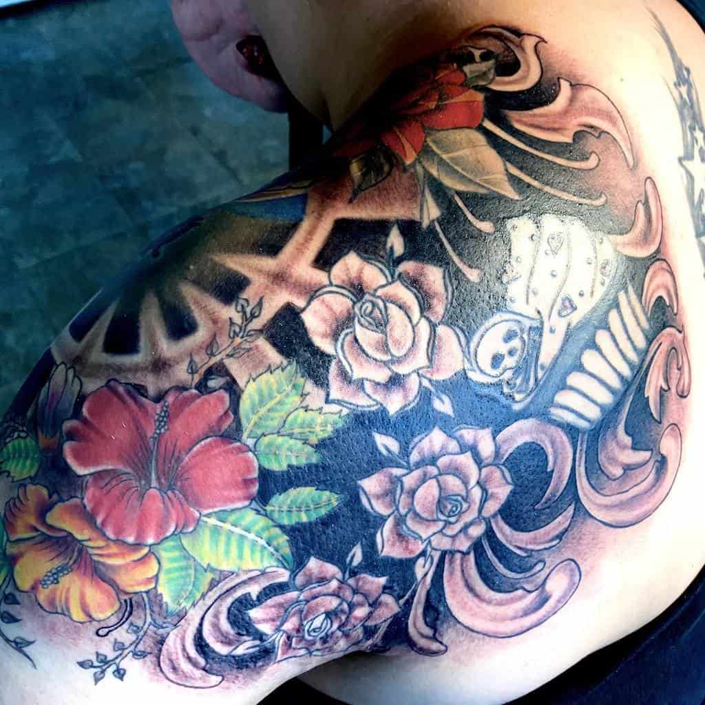 colorful flower shoulder tattoo izzy.tatt.oos