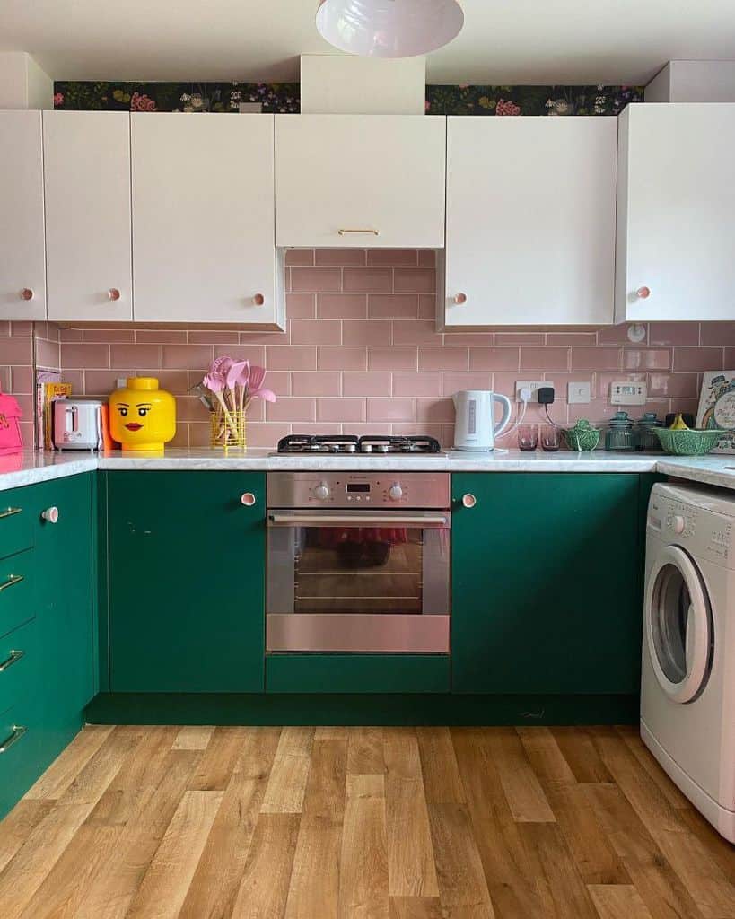 green kitchen cabinets pink subway tile backsplash 