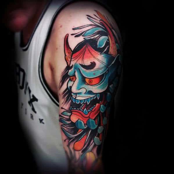 Colorful Modern Male Japanese Demon Mask With Flower Tattoo On Arm