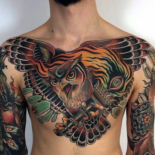 Colorful Neo American Male Ches Tattoo With Flaming Torch