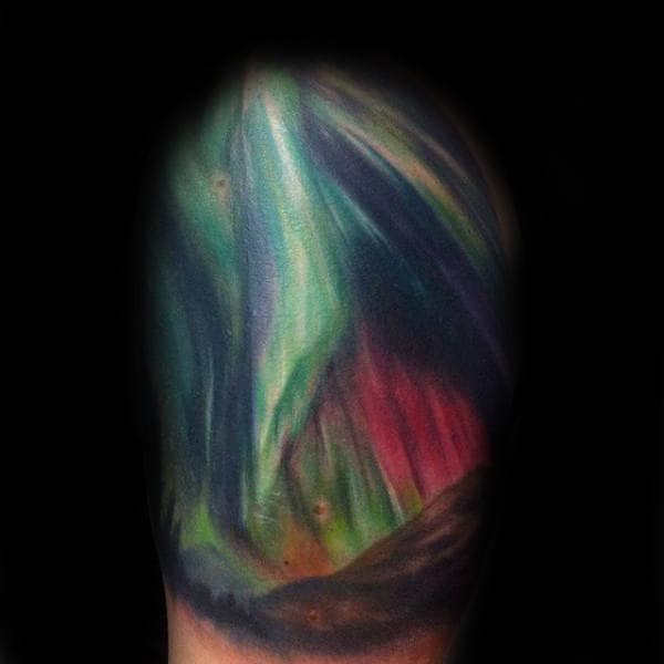 Colorful Northern Lights Upper Arm Tattoo On Gentleman