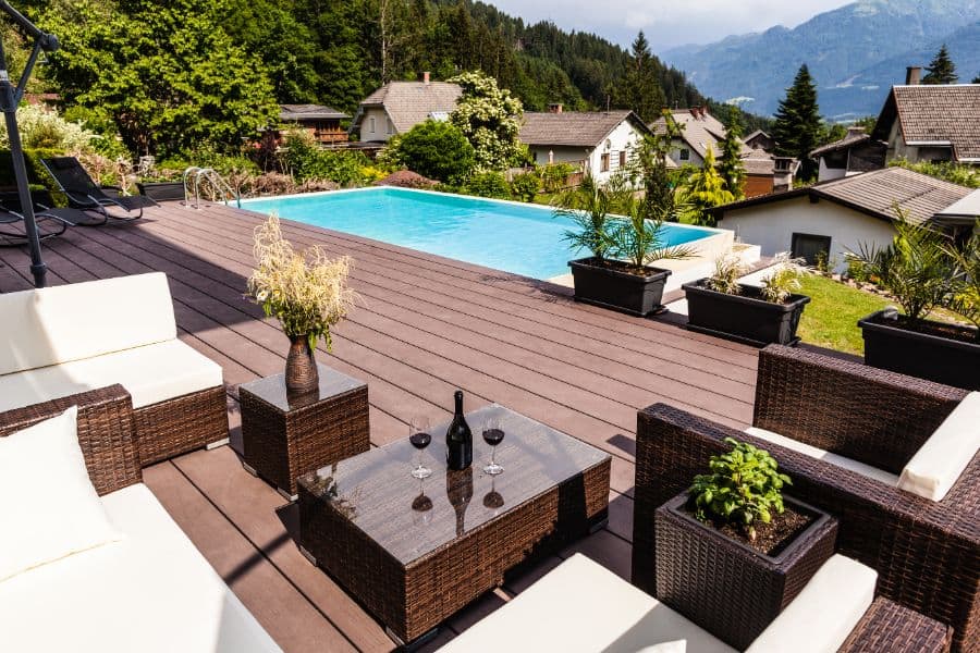 elevated wood deck pool backyard 