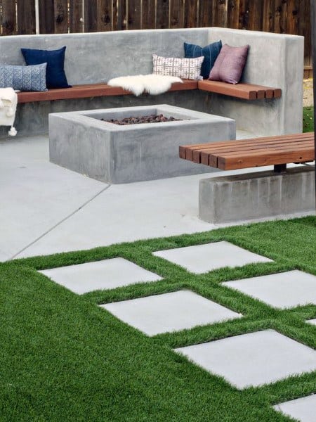 concrete patio fireplace wood bench