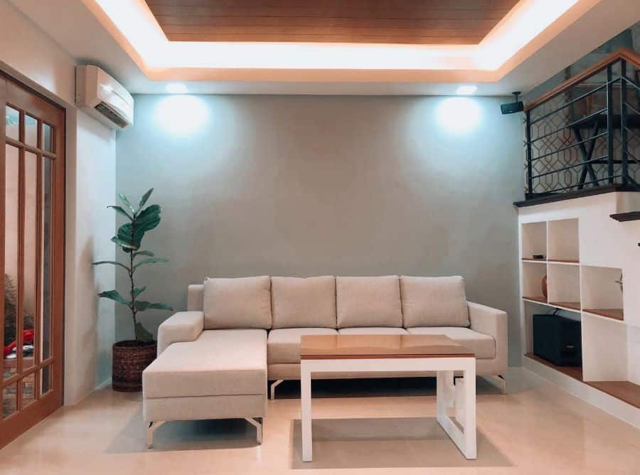 beige sofa in contemporary apartment living room 