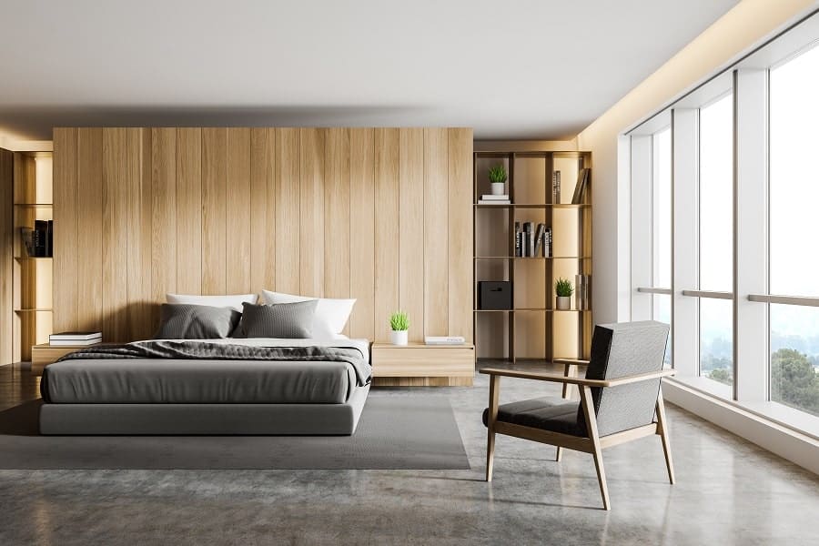 luxury minimalist modern bedroom with polished concrete flooring 