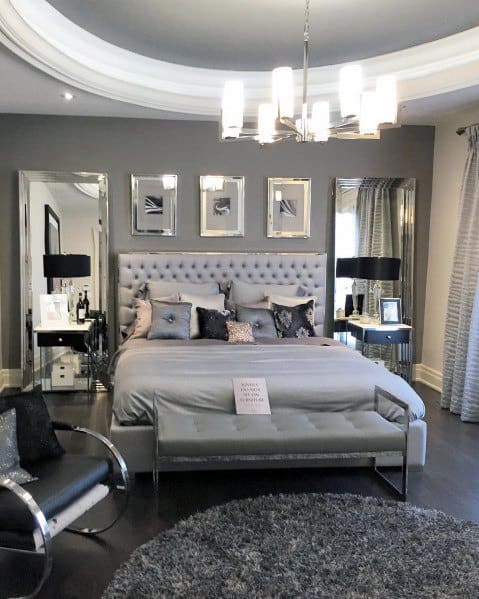 luxury elegant bedroom with ottoman 