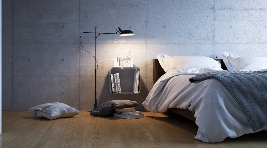 industrial concrete modern bedroom with platform bed