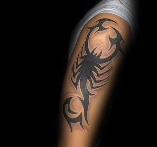 Cool Black Ink Tribal Scorpion With Shadow Tattoo On Arm For Men