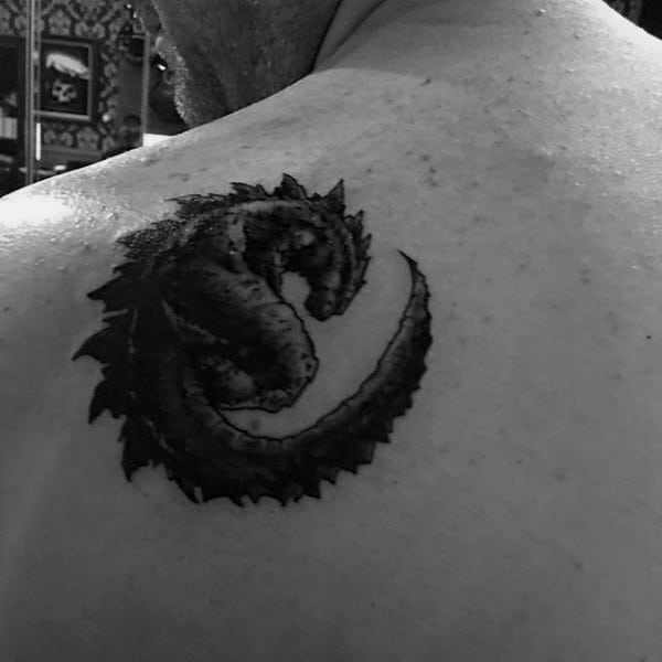 Cool Godzilla Ying Yang Circle Black Shaded Tattoo On Man Shoulder