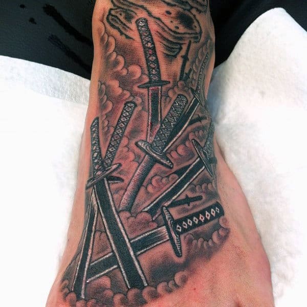 Cool Guys White Ink Foot Tattoo Of Swords In Clouds