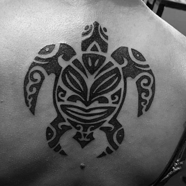 Cool Hawaiian Guys Tribal Turtle Tattoo With Black Ink Design On Upper Back
