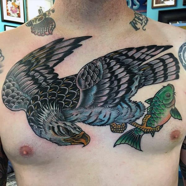 Cool Hawk Catching Carp Traditional Mens Tattoo On Chest