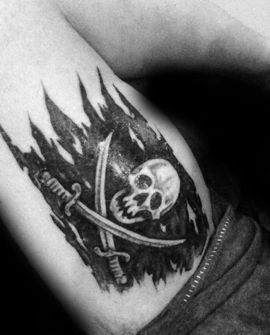 Cool Inner Arm Bicep Pirate Flag Tattoos For Men