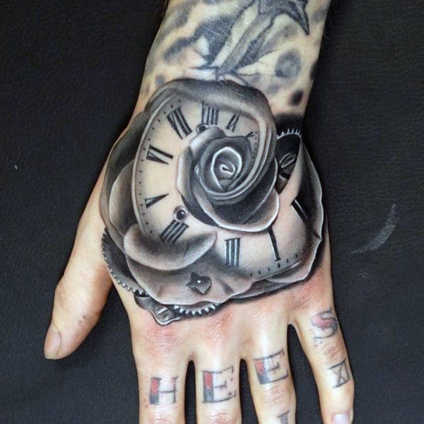 Cool Iron Grey Tattoo Of Rose And Clock Tattoo Male Hands