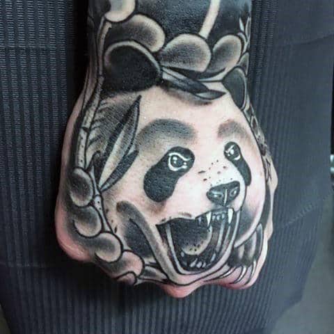 Cool Japanese Panda Bear Hand Tattoo On Gentleman