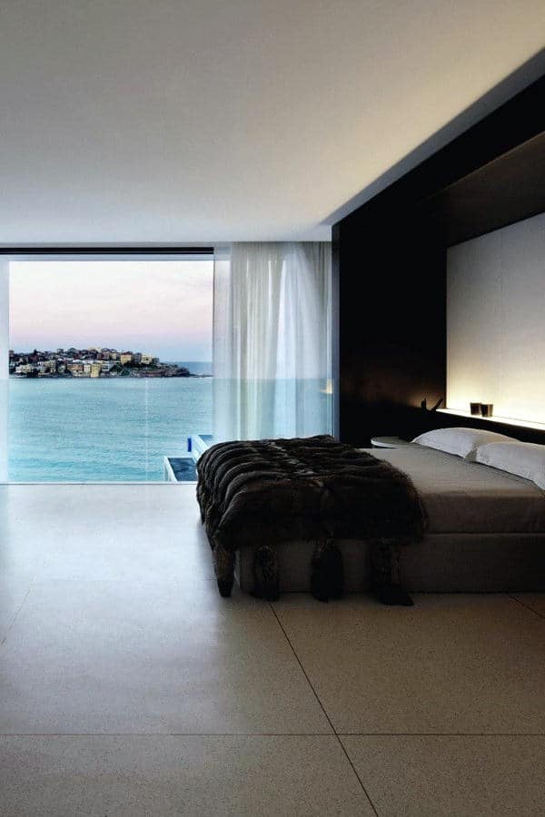 minimalist modern bedroom with ocean view 