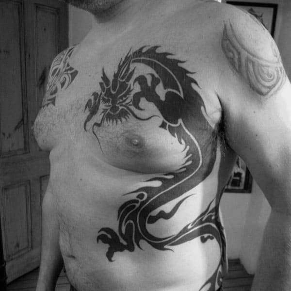Cool Mens Chest Black Tribal Dragon Tattoo Ideas