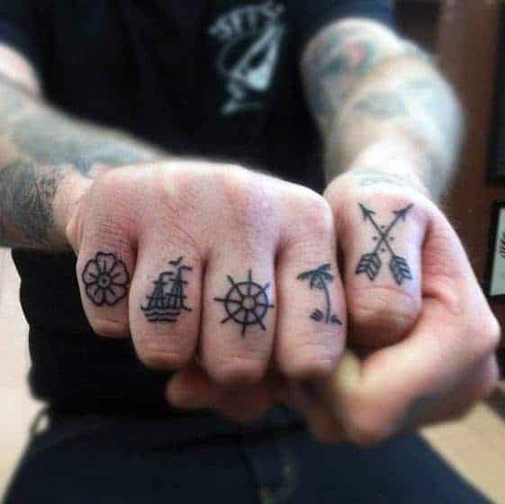 cool-mens-knuckle-tatooswith-ship-palm-trees-and-arrows