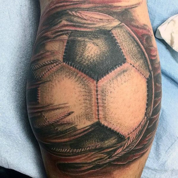 Cool Mens Ripped Skin Soccerball Tattoo On Leg Calf