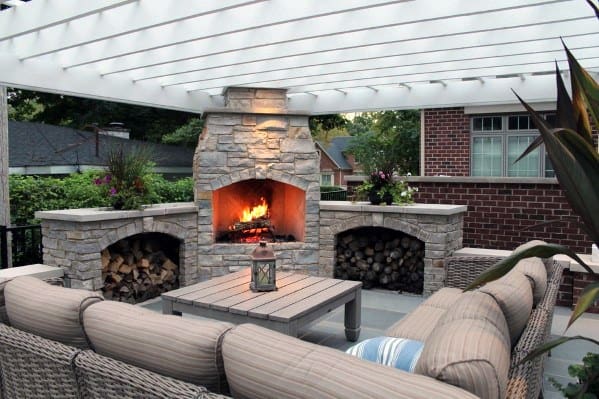 Cool Patio Fireplace With Firewood Storage Space