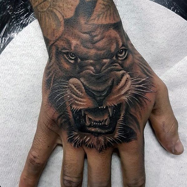 Cool Shaded Mens Lion Hand Tattoo