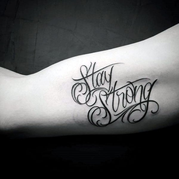 Cool Stay Strong Bicep Decorative Strength Tattoo For Guys