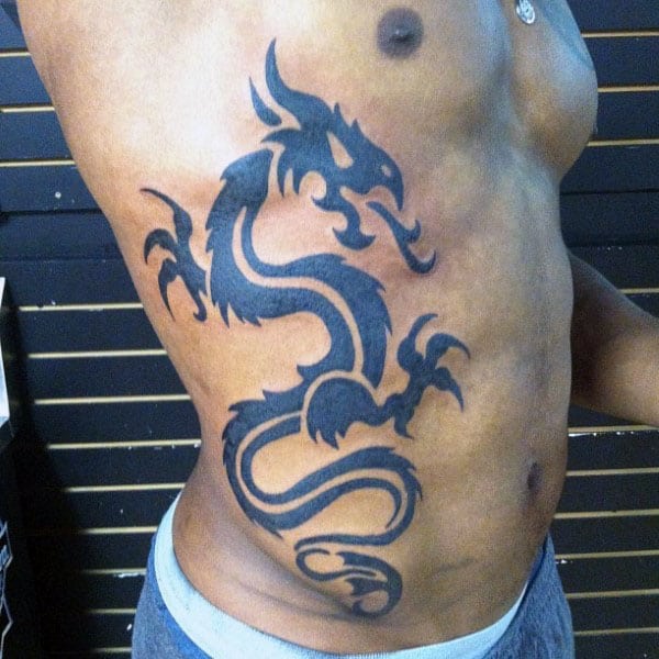 Cool Tribal Dragon Tattoos For Men On Rib Cage Side With Black Ink