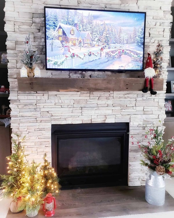 country living stone fireplace surround wall mounted tv christmas decorations 