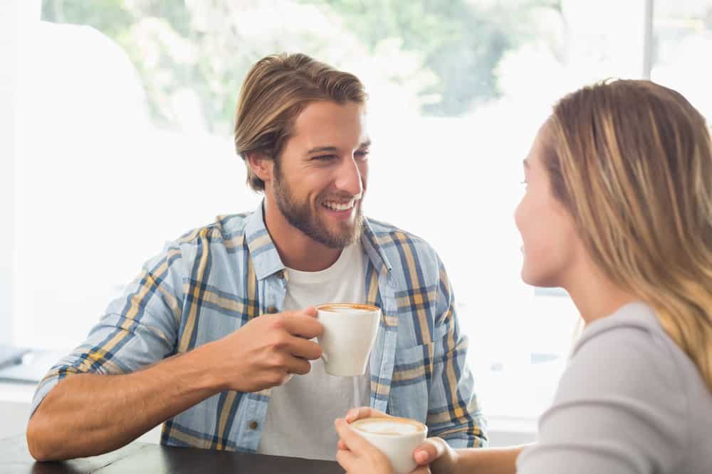 happy couple enjoying coffee