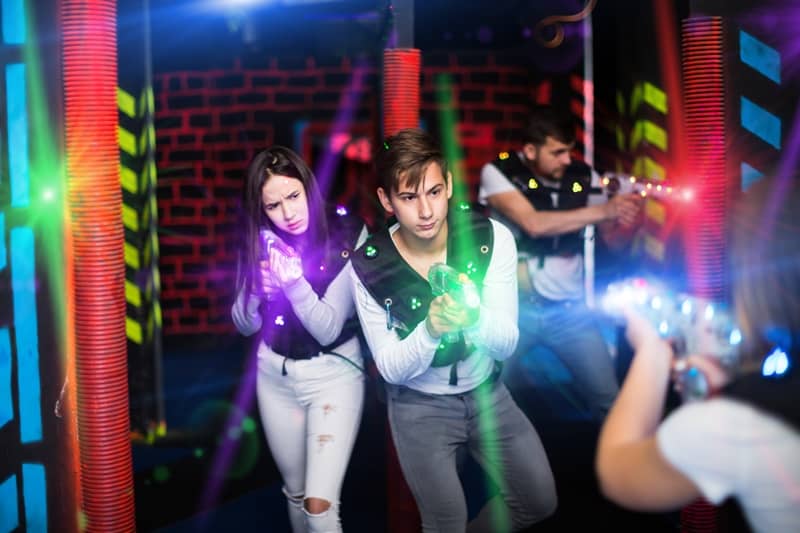 couple play laser tag