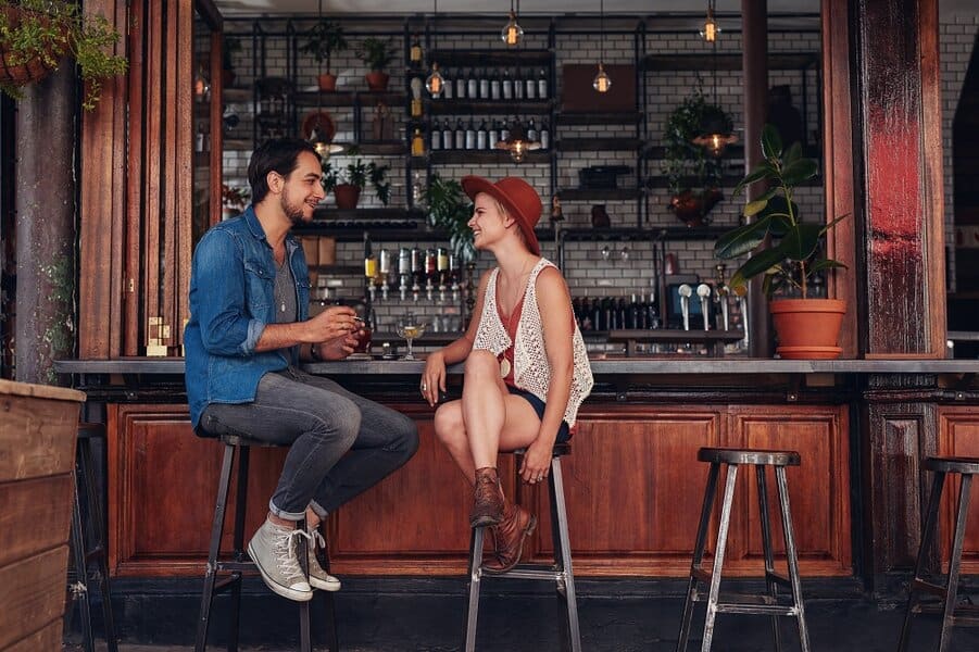couple sitting at cafe counter