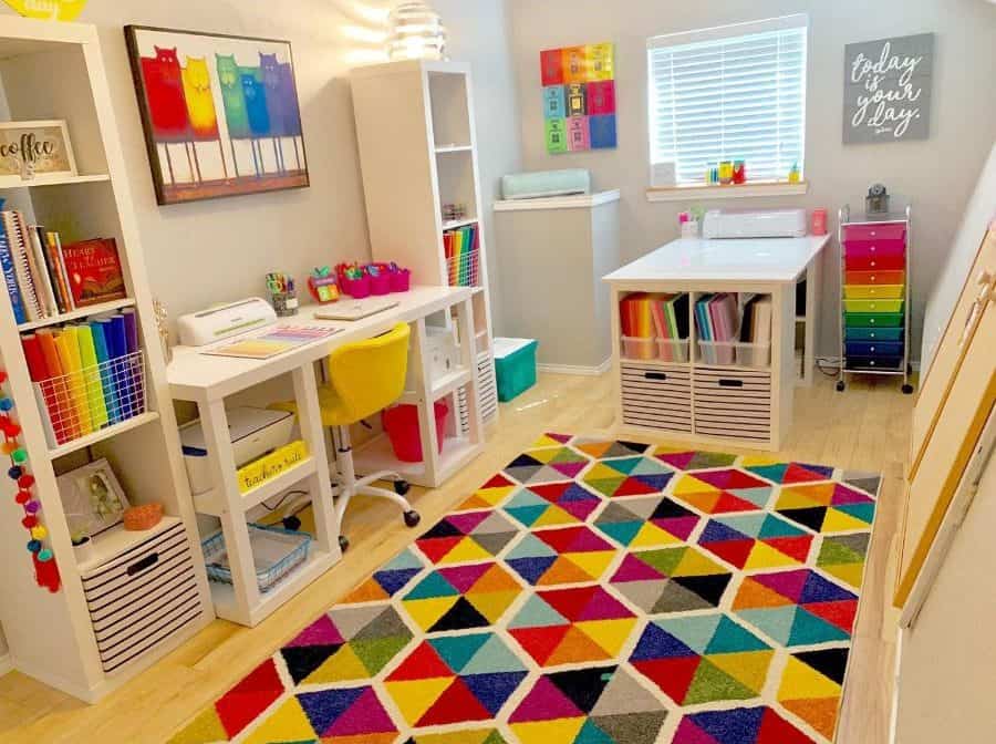 colorful craft room with desk and lots of storage space