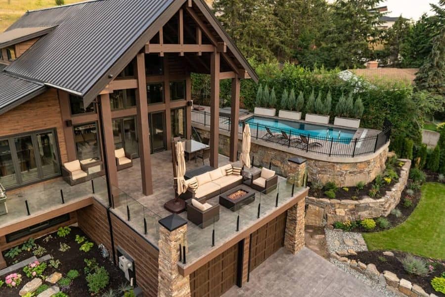 luxury craftsman style house fire pit swimming pool