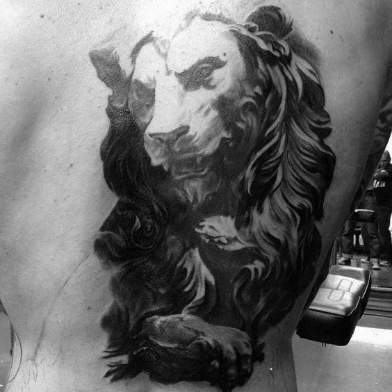Creative Back Lion Statue Tattoos For Men