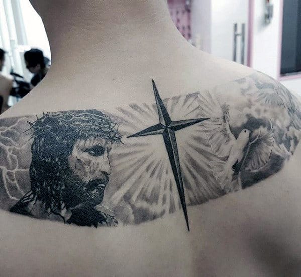 Creative Badass Male Jesus With Cross And Sun Rays Upper Back Tattoo