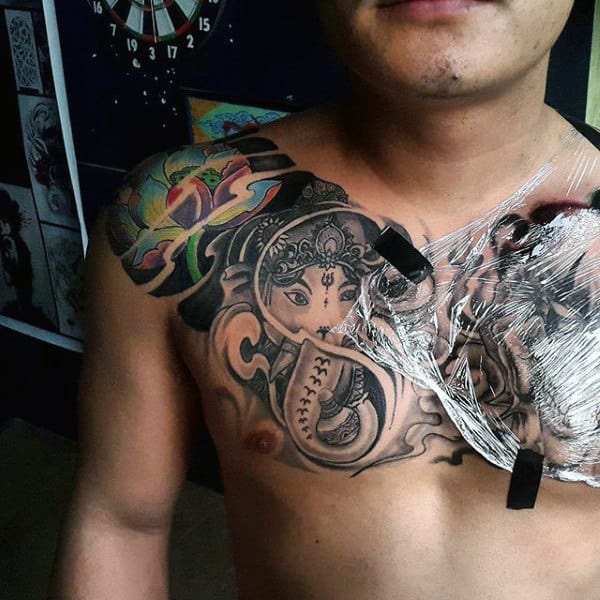 Creative Ganesh Male Chest Tattoo