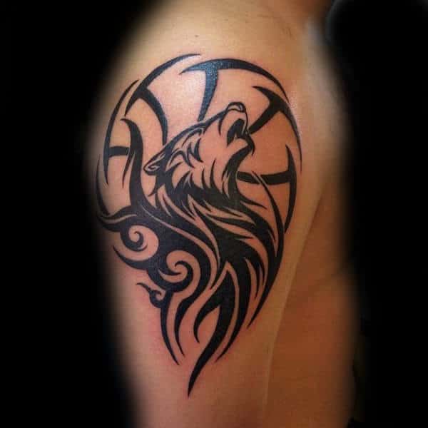 Creative Howling Tribal Wolf Moon Male Upper Arm Tattoo Design Ideas