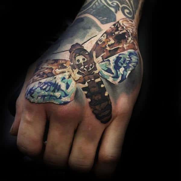 Creative Mens Hand Tattoo Of Flying Moth