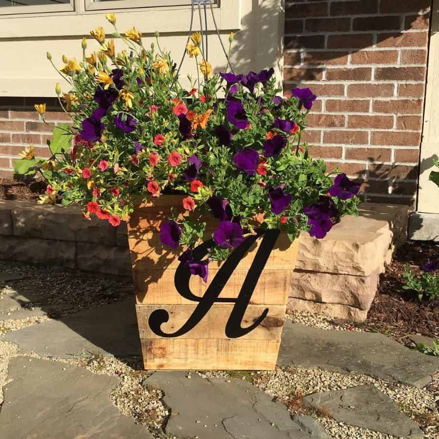 small creative pallet planter box with flowers