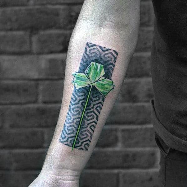 Creative Shamrock Clover Leaf With Black Geometric Background Tattoo For Guys On Inner Forearm