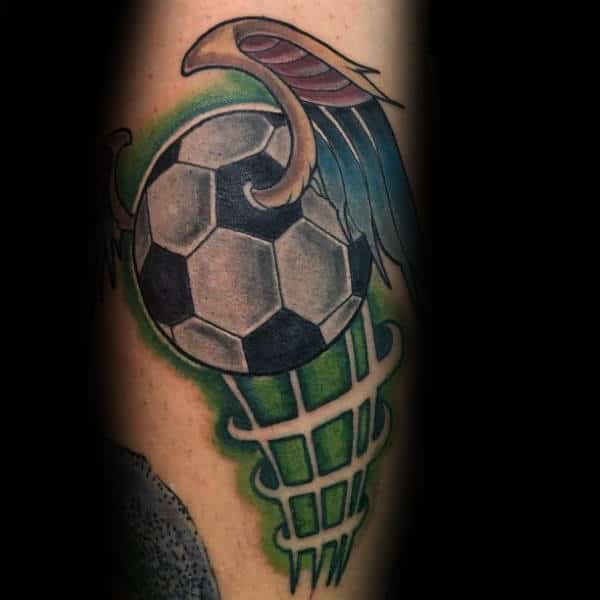 Creative Soccerball With Wings Guys Arm Tattoo