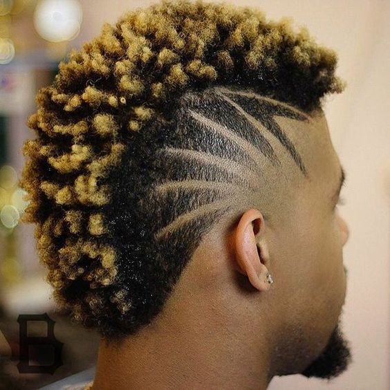 A curly frohawk haircut with beautiful patterns