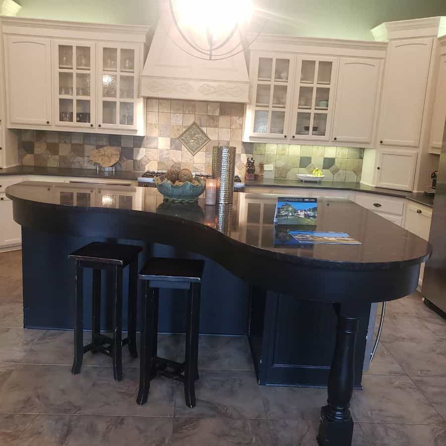 curved countertop island in country kitchen 